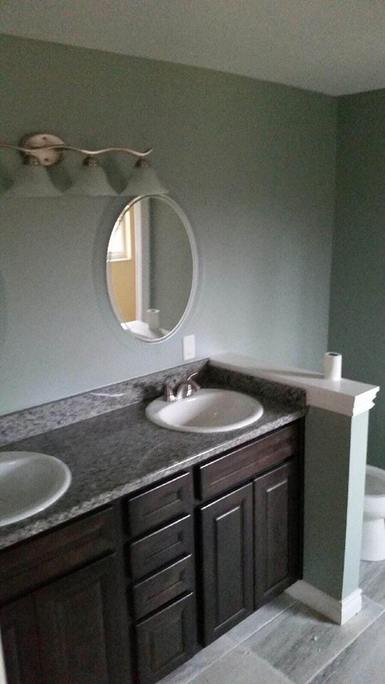Modern bathroom remodel in Dearborn, MI from Roman Floors & Remodeling