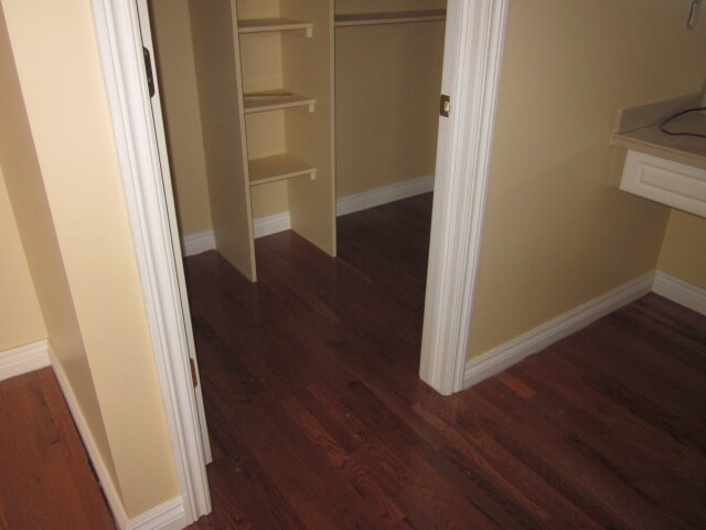 Dark hardwood flooring in closets in Detroit, MI from Roman Floors & Remodeling